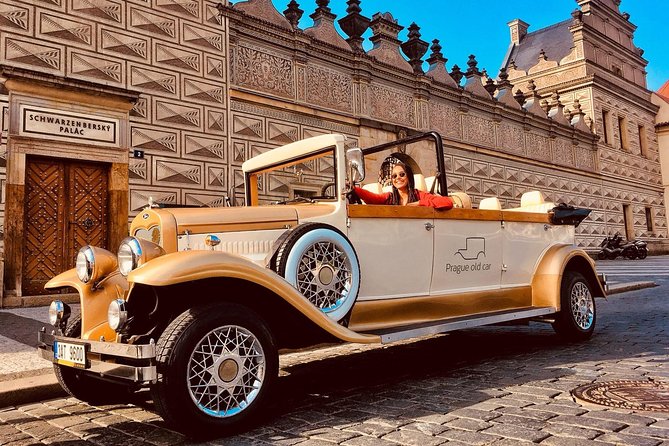 1,5 hour oldtimer convertible Prague sightseeing tour - Wenceslas Square and the National Theatre golden roof area