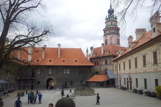 Cesky Krumlov One Day Trip from Prague by bus - Stop 1: Český Krumlov Castle interiors, courtyards, and the winter switch