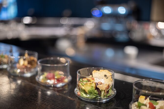 Czech Tapas with Unlimited Beverages at Stylish Restaurant Bar - Open kitchen energy, stylish bar mood, and late-night music