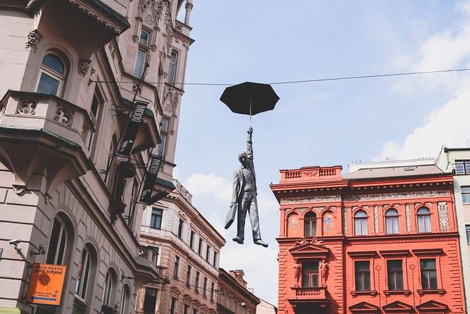 Discover Prague’s most Photogenic Spots with a Local - Freud’s hanging man: David Černý and the fun of thinking