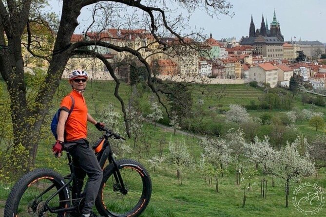 FAT TIRE E-BIKE GREAT TOUR - river, parks & panoramic views tour - Cernin Palace and Lennonova zeď: where old Prague meets modern Prague