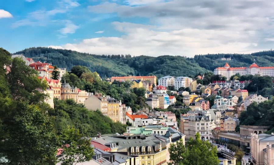 From Prague: Karlovy Vary Guided Day Trip - Guided Colonnades Walk: Architecture, Photo Stops, and Spring Tastings