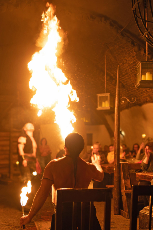 From Prague: Medieval Dinner, Show, Castle and Brewery - The Medieval tavern feast: unlimited Detenice beer and Moravian wine