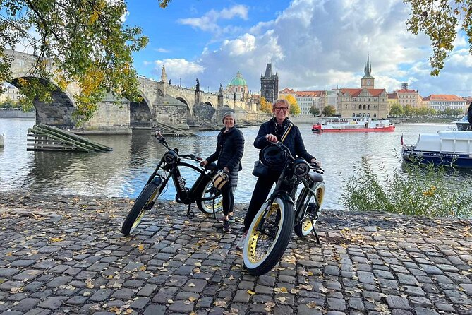 Grand City Tour of Prague on Retro Styled E-Bike - Charles Bridge and Lennon Wall: Two Iconic Stops in One Easy Flow