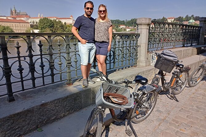 Historical Prague Guided E-Bike Tour - Old Town Square: timing the clock, markets, and the politics you feel in stone
