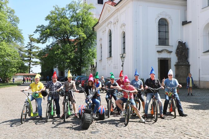 Live-Guided 180 min Glorious e-Scooter and eBike tour - First step at Maltezské Square, helmets on and control basics