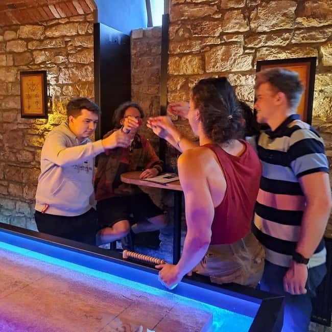 Ping pong or shuffleboard for up to 6 players - The vibe: friendly bar games with a simple goal