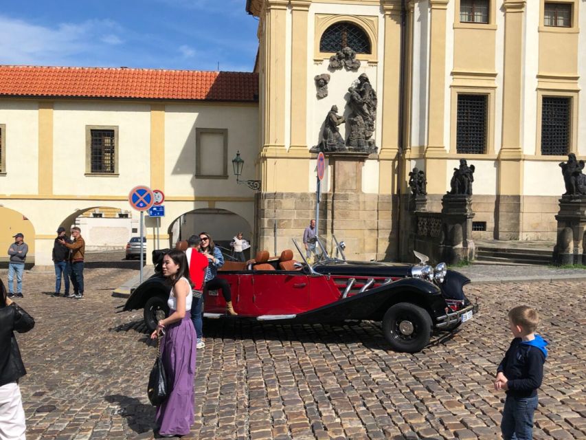 Prague: 1-Hour Private Tour in Vintage Car - Charles Bridge and the castle path, where the route really shines
