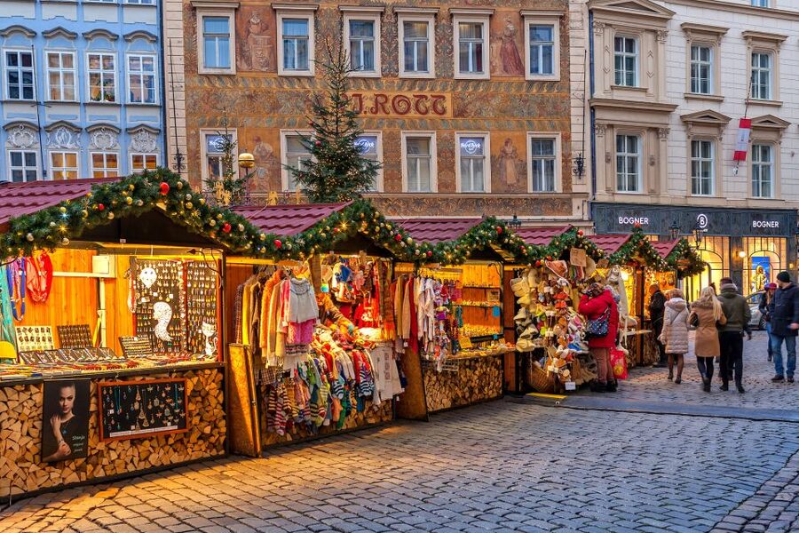 Prague: 2-3h Magical Christmas Markets Tour with Inclusions - NGO stalls and local community value you can feel in the details