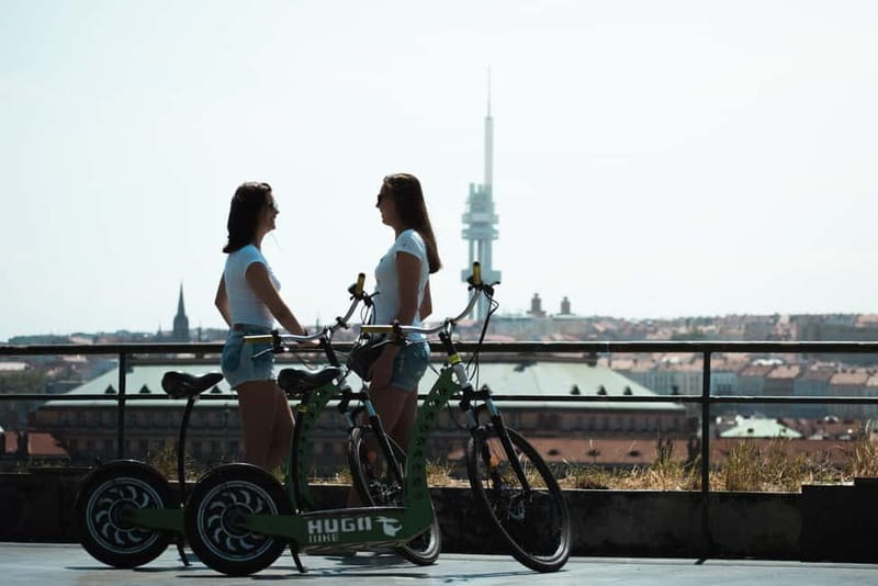 Prague: 3-Hour E-Scooter Tour in German - Charles Bridge and the National Theater, ending on big views