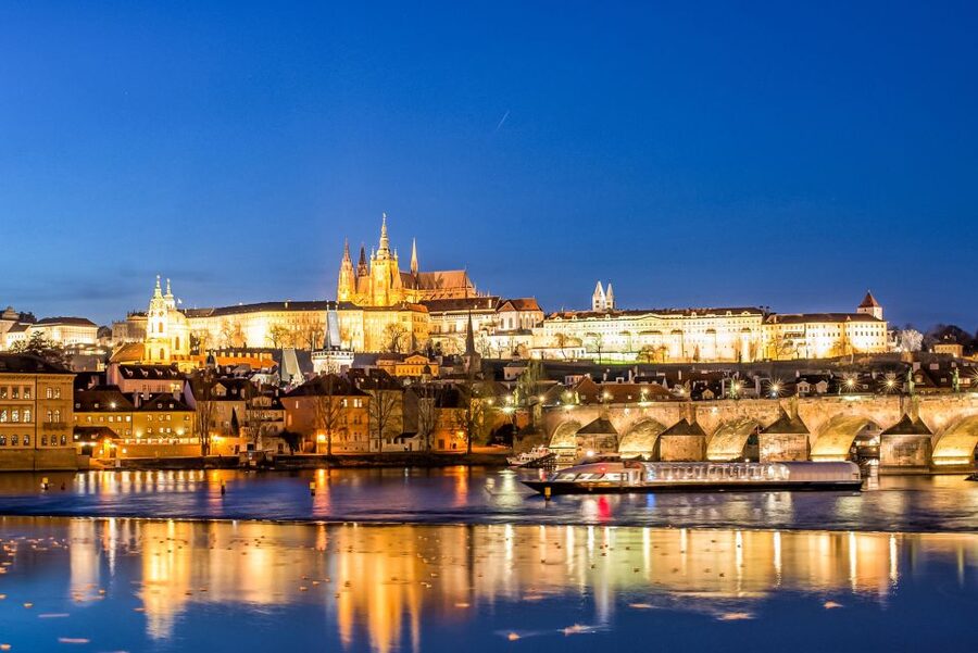 Prague Castle and the Charles Bridge above the Vltava at blue hour