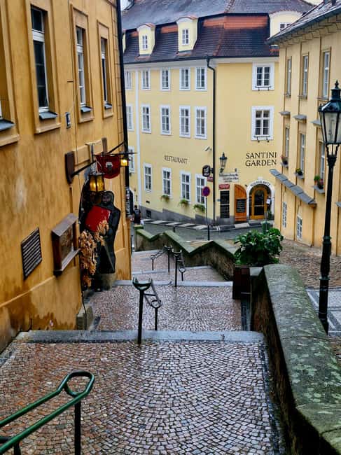 Prague after the sunset walking tour - Down through the Lesser Town: narrow streets and an easy break