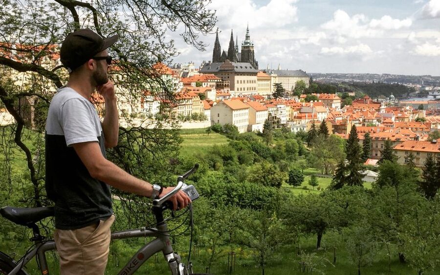 Prague "ALL-IN-ONE" City E-Bike Tour - John Lennon Wall, Charles Bridge approach, and Josefov’s atmosphere
