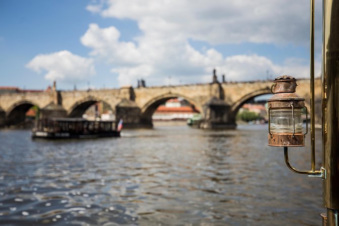Prague Castle and Canal River Boat Tour - Charles Bridge stops: museum artifacts and a classic wish moment