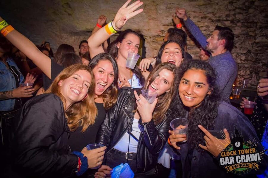 Prague: Clock Tower Bar Crawl ending at the BIGGEST CLUB - Start with optional open bar and drinking games that actually get you talking