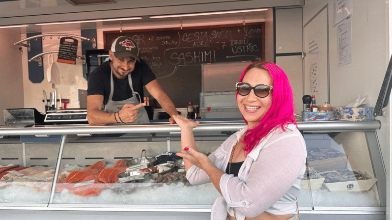 Prague: Farmers Market and Brunch Class with Celebrity Chef - The Náplavka Farmers Market start, guided by Mariko’s pink umbrella
