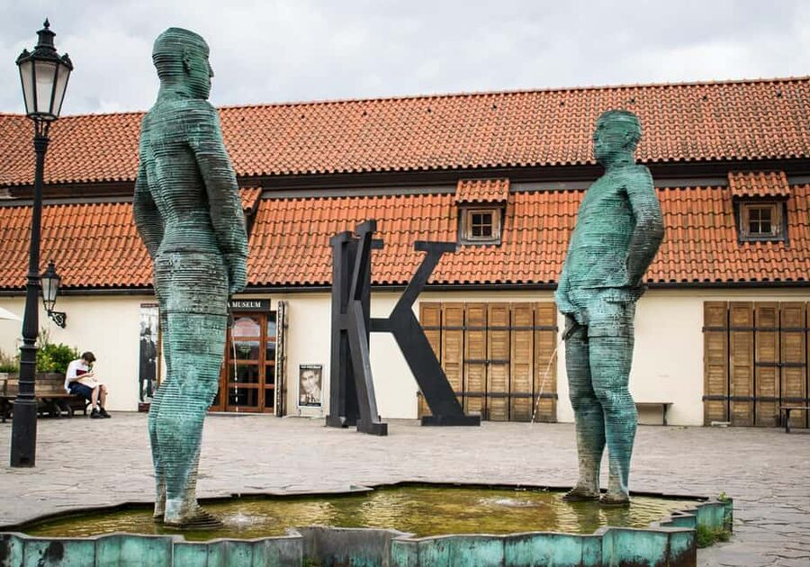 Prague: Food Tour with 10 Tastings of Classic Czech Dishes - A hidden courtyard with wine and small bites