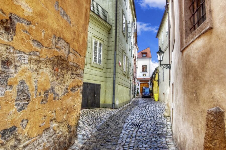 Prague: Full-Day Tour with Lunch and River Boat Cruise - Tram Up to Prague Castle: Courtyards, Old Royal Palace, Basilica of St. George