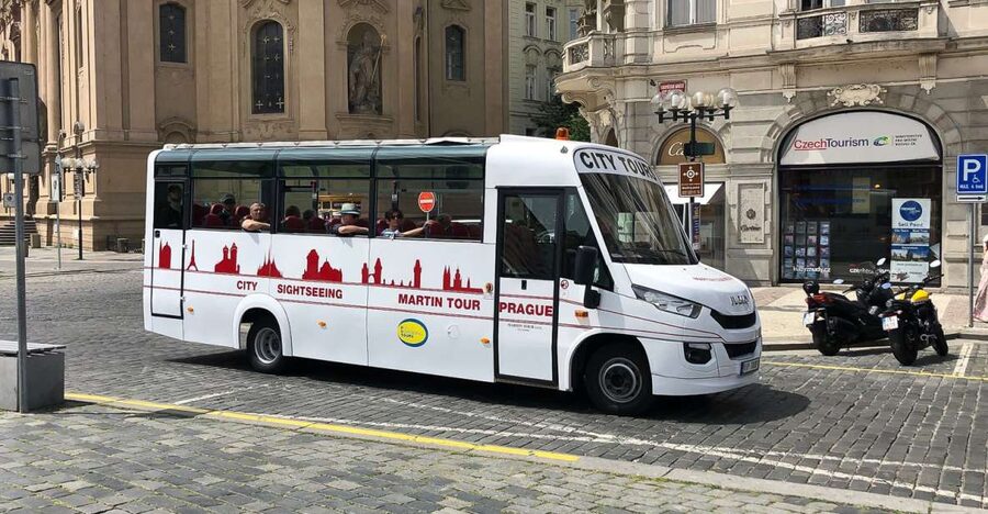 Prague: Historic City Center Bus Tour with Top Sights - Audio in 26 languages: helpful, but it is not a live guide
