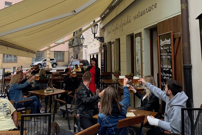 Prague Historic Pub Tour with Drinks Included - Stop 4: Charles Bridge walk, the Jewish quarter area, and a theatre stop
