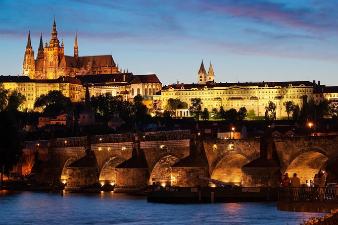 Prague Night Tour and River Vltava Dinner Cruise - Boarding the Vltava Boat: Aperitif, Indoor Cool-Down, and Deck Time