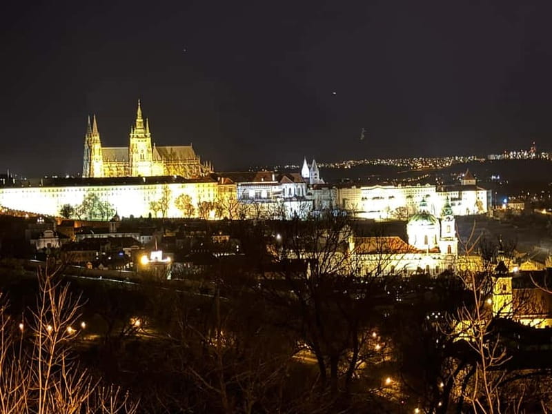 Prague: Night Walk through Prague Castle with City Views - The moat, the gates, and Rudolf II’s illuminated courtyard moments