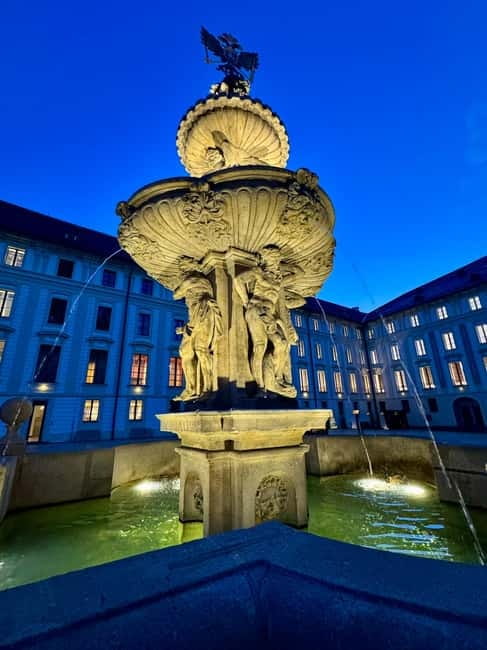 Prague: Night Walk through Prague Castle with City Views - St. Vitus Cathedral at night and the voices of Charles IV