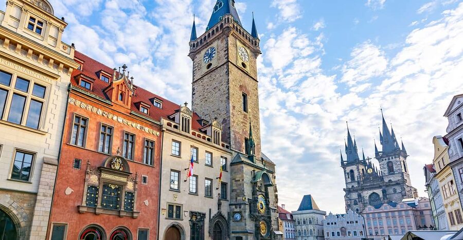 Prague: Old Town Guided Walking Tour and City Boat Ride - Meeting at Cartier on Old Town Square, and why that matters