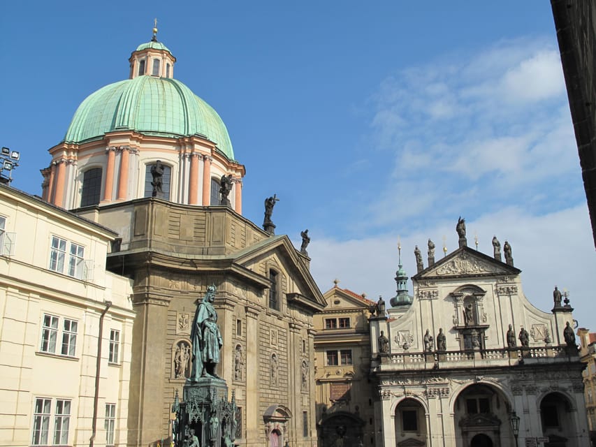 Prague: Old Town Guided Walking Tour and City Boat Ride - The Vltava River boat ride: headset stories, castle photos, and a calmer pace