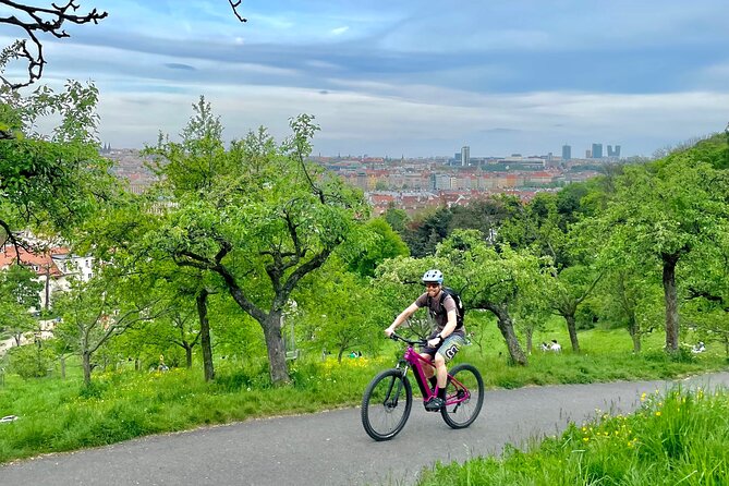 Prague on E-Bike:Explore Greater Downtown Parks & Epic Views - A flat white break by the river, then back to climbing