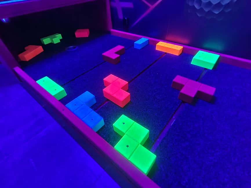 Prague: Punk Minigolf Glow-in-the-Dark Entry Ticket - Walking through the course, hole by hole energy