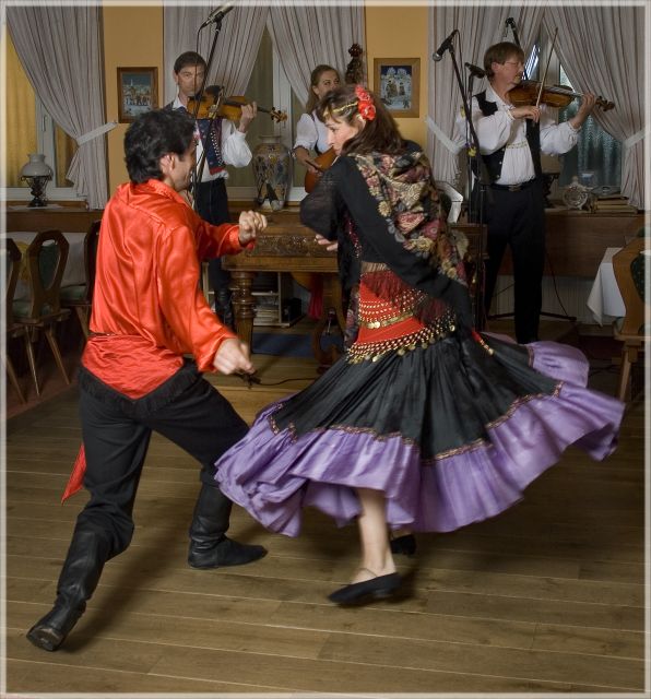 Prague: Traditional Folklore Evening with Dinner & Music - The private ride through historic Prague, then back down into the cellar