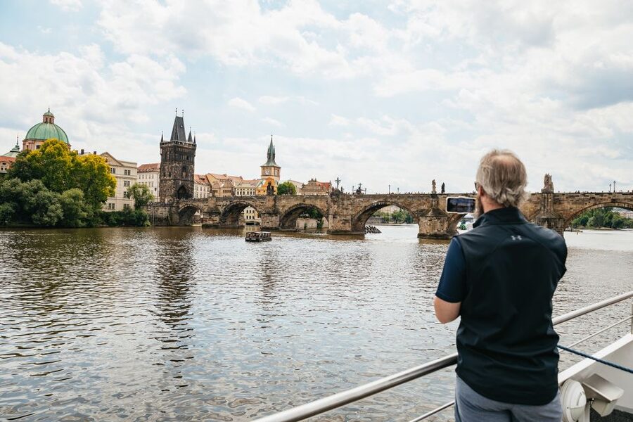 Prague: Vltava River Lunch Cruise in an Open-Top Glass Boat - The main sightseeing act: sailing under Charles Bridge and staring at Prague Castle