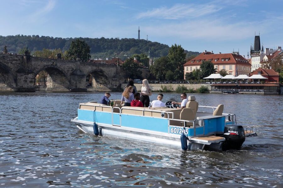 Private Boat Cruise With Unlimited Prosecco - How the sights roll by: Charles Bridge, National Theatre, and Kampa Island