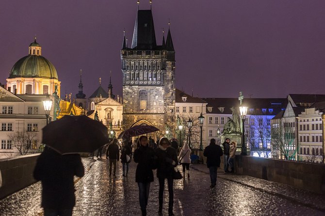 Private & Personalized Prague Night Tour with a Local Guide - Charles Bridge at night: statues, atmosphere, and that final story